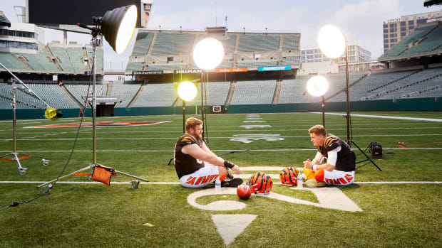 Ted Karras and Joe Burrow sit
